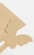 FK Invisible adhesive BUTTERFLY thong in beige