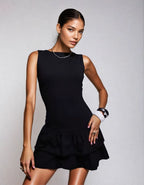 Exclusive Cotton Sleeveless Drop Waist Ruffle Hem Mini Dress in Black