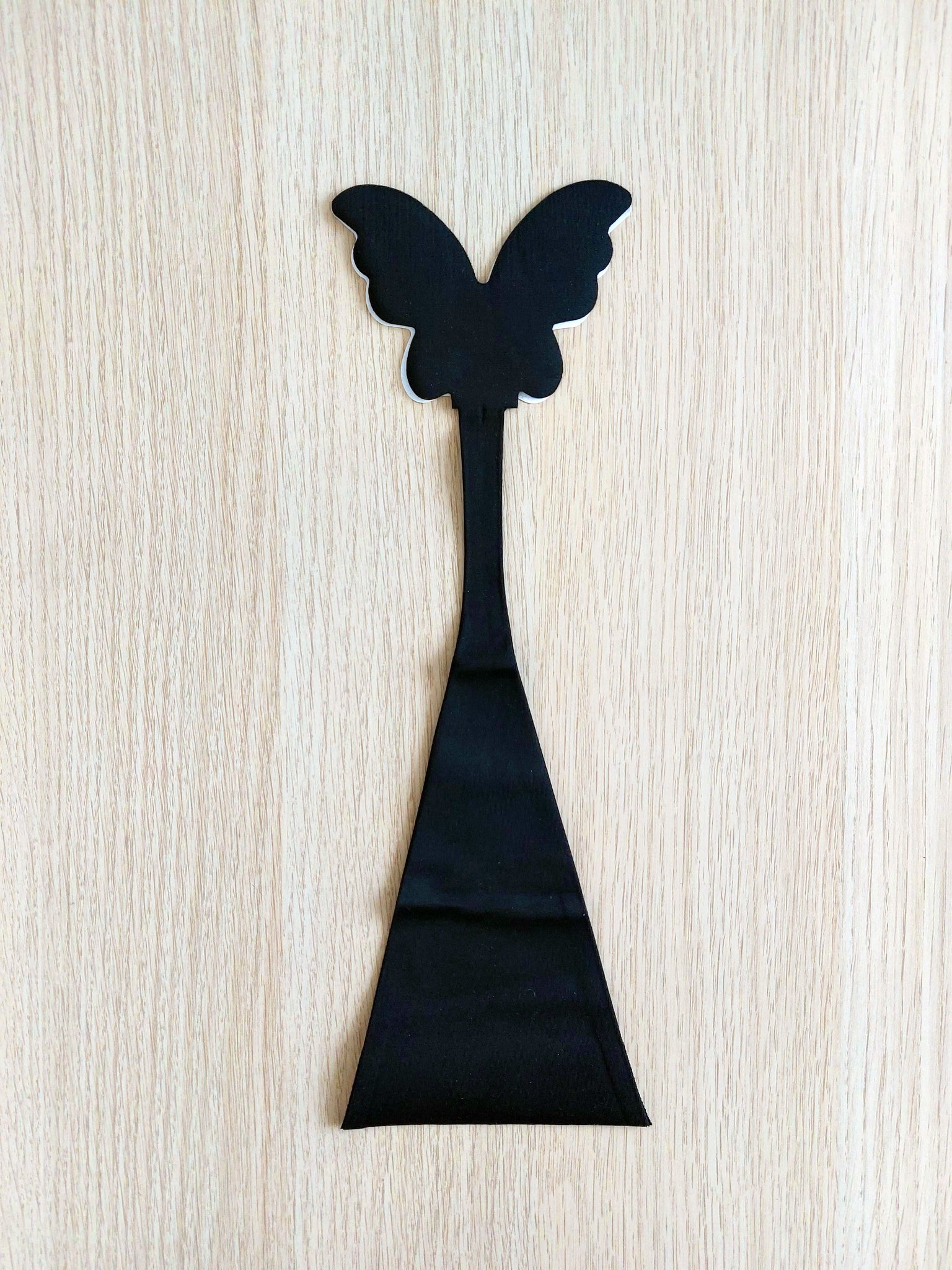 FK Invisible adhesive BUTTERFLY thong in black